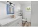 Clean bathroom featuring new vanity, mirror, and hardware at 102 N Brooks Cir, Oak Hill, FL 32759