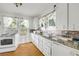Bright kitchen featuring updated appliances and counter tops at 102 N Brooks Cir, Oak Hill, FL 32759