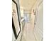 Bathroom with double vanity, tiled floors and a separate shower stall with a curtain at 103 Old Mill Pond Rd, Edgewater, FL 32141