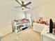 ' bedroom featuring bunk beds and a window, creating a lively atmosphere at 103 Old Mill Pond Rd, Edgewater, FL 32141