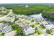 Beautiful aerial view of a residential home near a serene lake and lush greenery at 1221 Siesta Key Cir, Port Orange, FL 32128