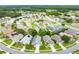 Aerial view of the light green home nestled in a well-manicured neighborhood at 1221 Siesta Key Cir, Port Orange, FL 32128