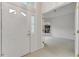 Entryway with tile floors and a view of carpeted living area at 1221 Siesta Key Cir, Port Orange, FL 32128