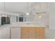 Spacious kitchen with island, pendant lighting, and modern appliances at 1221 Siesta Key Cir, Port Orange, FL 32128