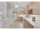 Bright kitchen with ample cabinet space, white countertops and appliances at 1221 Siesta Key Cir, Port Orange, FL 32128