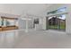 Spacious living room with open design, window bench, and plenty of natural light at 1221 Siesta Key Cir, Port Orange, FL 32128