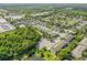 Overhead perspective showcasing the community pool and surrounding lush greenery at 1453 River Rock Ct, Oviedo, FL 32765