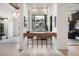 Entertainer's wet bar features wood countertops, and open shelving for displaying drinks and glassware at 1616 Turnbull Crossings Dr, New Smyrna Beach, FL 32168