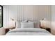 Elegant bedroom featuring a plush bed, minimalist decor, and stylish lighting for a serene ambiance at 1616 Turnbull Crossings Dr, New Smyrna Beach, FL 32168