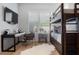Bright bedroom with stylish bunk bed, modern desk, and large windows providing ample natural light at 1616 Turnbull Crossings Dr, New Smyrna Beach, FL 32168
