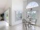 Bright breakfast nook with great lake views and sliding glass door to lanai at 1809 Forough Cir, Port Orange, FL 32128