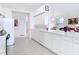 Bright kitchen featuring modern appliances, tiled floor, and ample cabinet space at 1809 Forough Cir, Port Orange, FL 32128