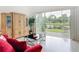 Living room showcasing modern decor and beautiful views of the pond at 1809 Forough Cir, Port Orange, FL 32128
