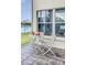 Screened in patio features a scenic lake view at 1809 Forough Cir, Port Orange, FL 32128