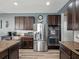 Kitchen boasts stainless steel appliances, granite countertops, and plentiful storage at 19 Abacus Ave, Ormond Beach, FL 32174