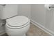 A close up view of a standard white toilet at 19 Abacus Ave, Ormond Beach, FL 32174