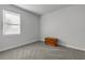Bedroom is bright with a window and neutral colors and carpet at 1929 Pioneer Trl, New Smyrna Beach, FL 32168