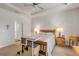 The main bedroom features steps for easy bed access and bedside lamps at 1929 Pioneer Trl, New Smyrna Beach, FL 32168