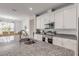 Bright kitchen with granite countertops and stainless steel appliances at 1929 Pioneer Trl, New Smyrna Beach, FL 32168