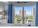 Balcony view with outdoor seating overlooking nearby buildings with views of the ocean at 2 Oceans West Blvd # 608, Daytona Beach Shores, FL 32118