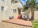 Backyard with deck, outdoor seating, and mature palm trees at 20 N Halifax Ave, Daytona Beach, FL 32118