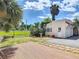 The backyard area features a wooden deck and a detached garage at 20 N Halifax Ave, Daytona Beach, FL 32118