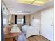 A cozy bedroom featuring twin beds and natural light at 20 N Halifax Ave, Daytona Beach, FL 32118