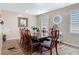 Elegant dining room with a large table, seating for eight, and stylish decor at 20 N Halifax Ave, Daytona Beach, FL 32118