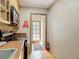 Functional kitchen area with an exit door to the outside at 20 N Halifax Ave, Daytona Beach, FL 32118