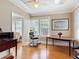 Sunlit living room boasting hardwood floors, vintage details, and an open layout at 20 N Halifax Ave, Daytona Beach, FL 32118