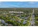 An aerial view of the neighborhood, showcasing lush greenery and tree-lined streets at 2009 Brian Ave, South Daytona, FL 32119