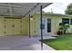 Charming home featuring a bright yellow exterior, white trim, and carport at 2009 Brian Ave, South Daytona, FL 32119