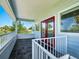Inviting balcony with stylish tile flooring, offering scenic views and a relaxing outdoor space at 206 S Riverside Dr, Edgewater, FL 32132
