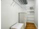 Walk-in closet offers storage with multiple shelves and drawers for organization at 206 S Riverside Dr, Edgewater, FL 32132