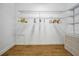Walk-in closet with wooden floors at 206 S Riverside Dr, Edgewater, FL 32132