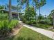 Attractive two-story home featuring a well-manicured lawn and a serene setting at 206 S Riverside Dr, Edgewater, FL 32132