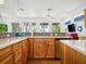 Modern kitchen with granite countertops, stainless steel appliances, and ample counter space at 206 S Riverside Dr, Edgewater, FL 32132