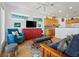 Inviting living area with lots of light featuring hardwood floors, and an open layout at 206 S Riverside Dr, Edgewater, FL 32132