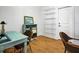 Cozy office space with hardwood floors, perfect for remote work at 206 S Riverside Dr, Edgewater, FL 32132