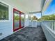 Spacious porch with a view of the neighborhood at 206 S Riverside Dr, Edgewater, FL 32132