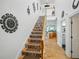 Staircase with decorative tile risers leading to the main living area at 206 S Riverside Dr, Edgewater, FL 32132