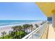 Relaxing condo balcony with ocean views, perfect for enjoying coastal breezes and beach living at 2300 N Atlantic Ave # 203, Daytona Beach, FL 32118