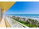 Lovely oceanfront condo balcony with breathtaking views and coastal charm, perfect for relaxation at 2300 N Atlantic Ave # 203, Daytona Beach, FL 32118