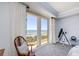 Relaxing balcony view showcasing the ocean with seating and a telescope at 2300 N Atlantic Ave # 203, Daytona Beach, FL 32118