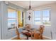 Cozy breakfast nook with ocean views, and a table for four at 2300 N Atlantic Ave # 203, Daytona Beach, FL 32118