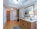 Inviting entryway with wooden floors and a decorative console table at 2300 N Atlantic Ave # 203, Daytona Beach, FL 32118