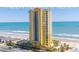 Luxury condo building in Daytona Beach with beautiful ocean views, palm trees and coastal elegance at 2300 N Atlantic Ave # 203, Daytona Beach, FL 32118