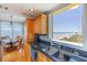 Lovely kitchen featuring stainless appliances, granite countertops, and ocean views at 2300 N Atlantic Ave # 203, Daytona Beach, FL 32118