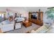Comfortable living room with ocean views, plush seating, and entertainment center at 2300 N Atlantic Ave # 203, Daytona Beach, FL 32118