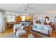 Inviting living area flows into a dining and kitchen area for seamless entertaining at 2300 N Atlantic Ave # 203, Daytona Beach, FL 32118